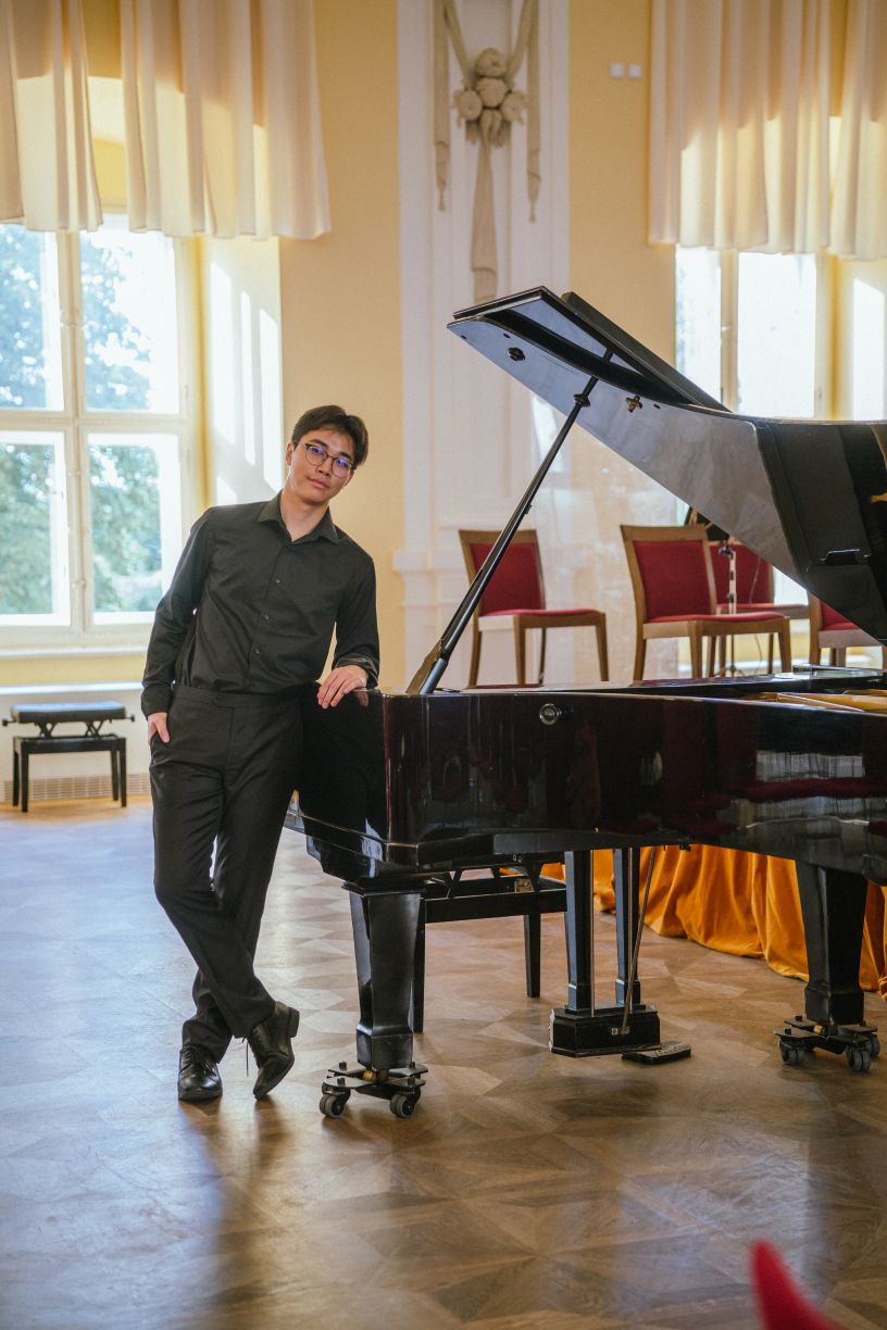 Micah Lam by Concert Grand Piano